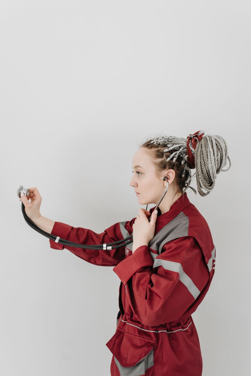 woman holding a stethoscope